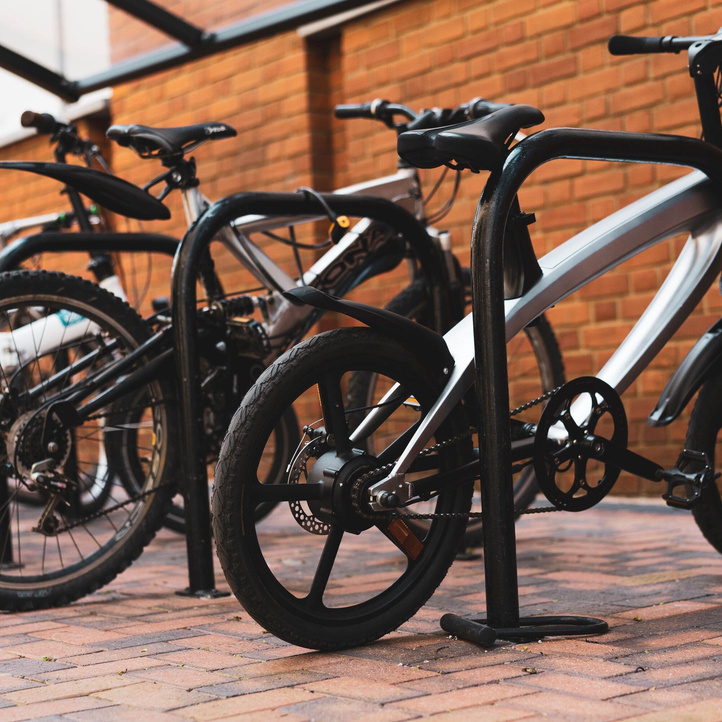 Cruzaa Carbon Black Electric Bike Parked