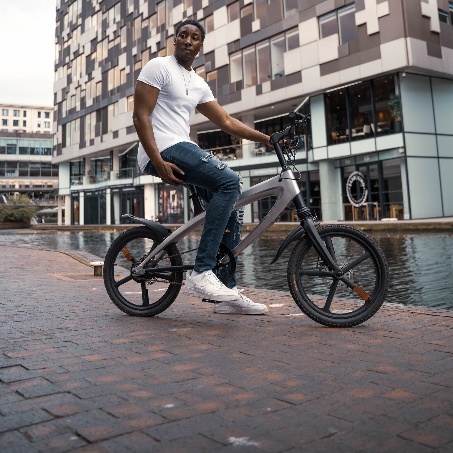 Cruzaa Carbon Black Electric Bike Water View